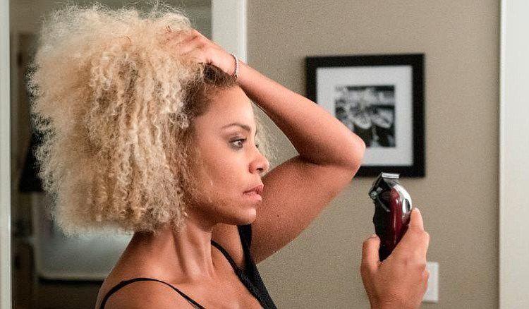 Actress Sanaa Lathan in “Nappily Ever After.” In this scene, Lathan shaves her head out of frustration.