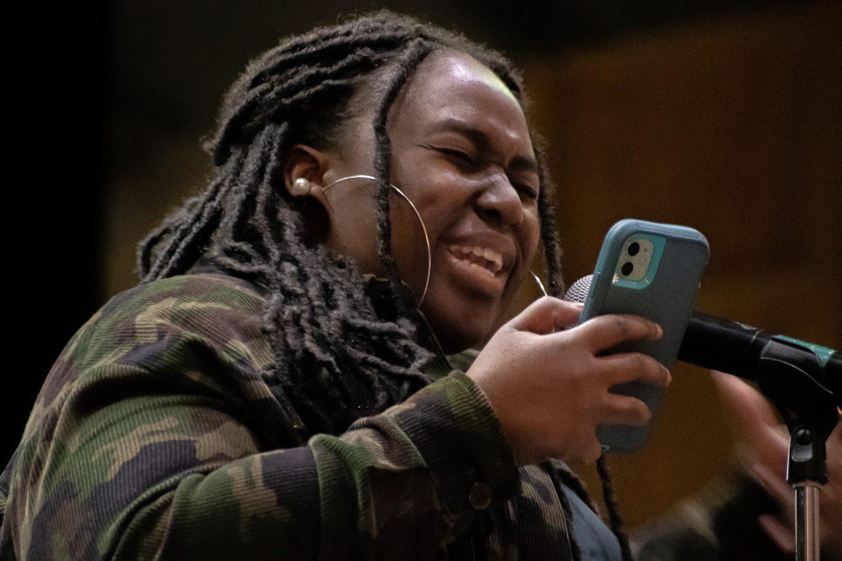 Jimeya Mayes performs a spoken-word poem. Mayes was among three other poets who shared their pieces with the Ida Waldran crowd. 