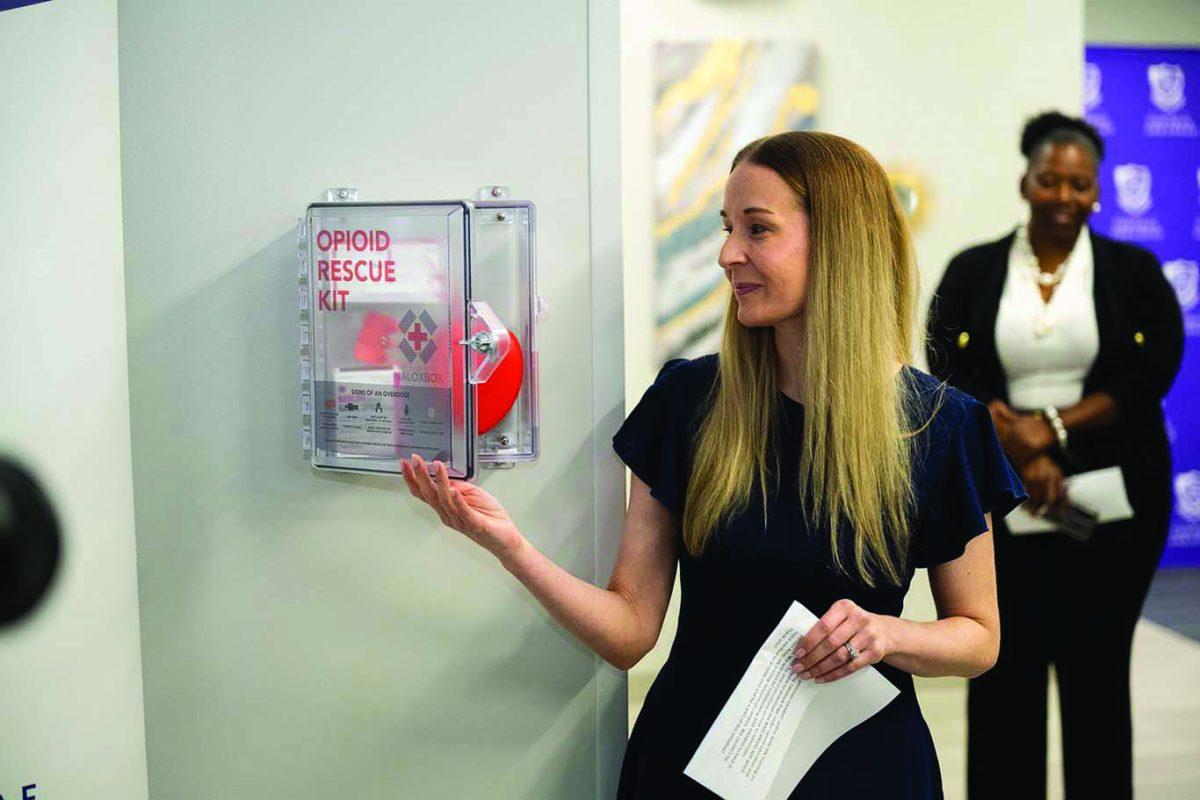 Stephanie Rose, the program director of UCA’s addiction studies program and assistant professor for the Department of Health Sciences, demonstrates how to use a Naloxbox. The Naloxbox mission is to improve the capacity of bystander rescuers to save the lives of victims of opioid overdose.
