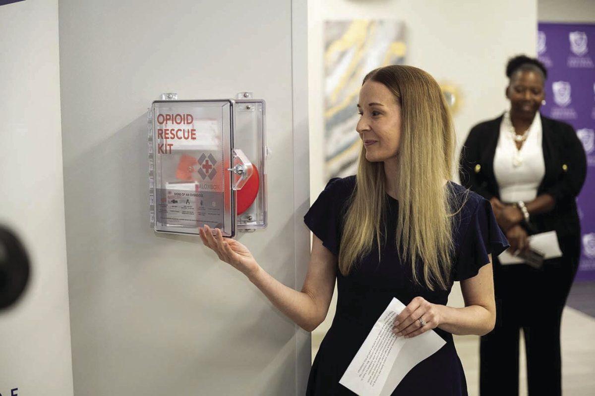 Stephanie Rose, the program director of UCA’s addiction studies program and assistant professor for the Department of Health Sciences, demonstrates how to use a Naloxbox. The Naloxbox mission is to improve the capacity of bystander rescuers to save the lives of victims of opioid overdose.