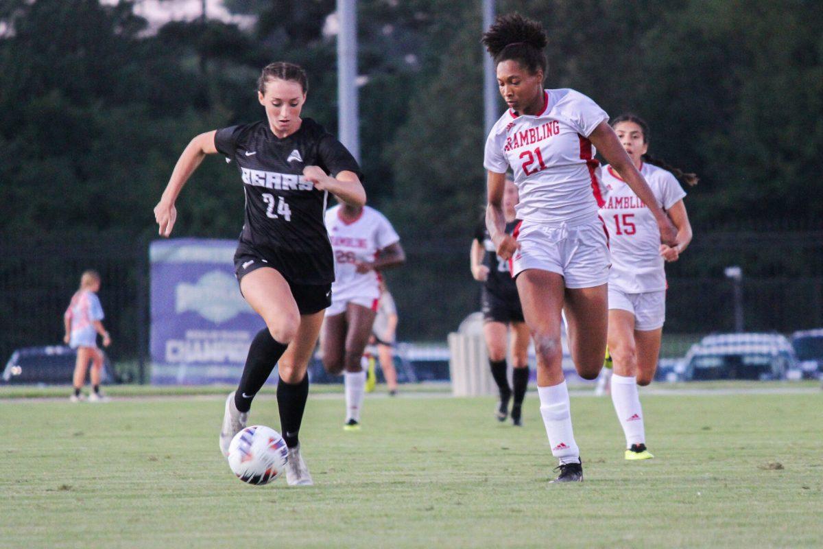 Freshman forward Tristyn Pavatt runs with the ball from Grambling State University’s junior defender Adrianna Pratt during a home game Friday, Sept. 9. The Bears won the game 2-0. The women’s soccer next played home against Oklahoma State University Sept. 11, where Pavatt almost scored in the frst minute. The Bears fell 3-0 against Oklahoma.