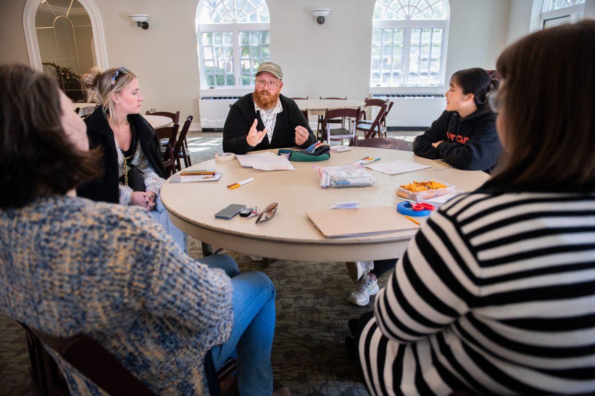 Mike Durkin speaks to a group of students during the workshop. Durkin spoke about the unique ways different cultures prepare foods.