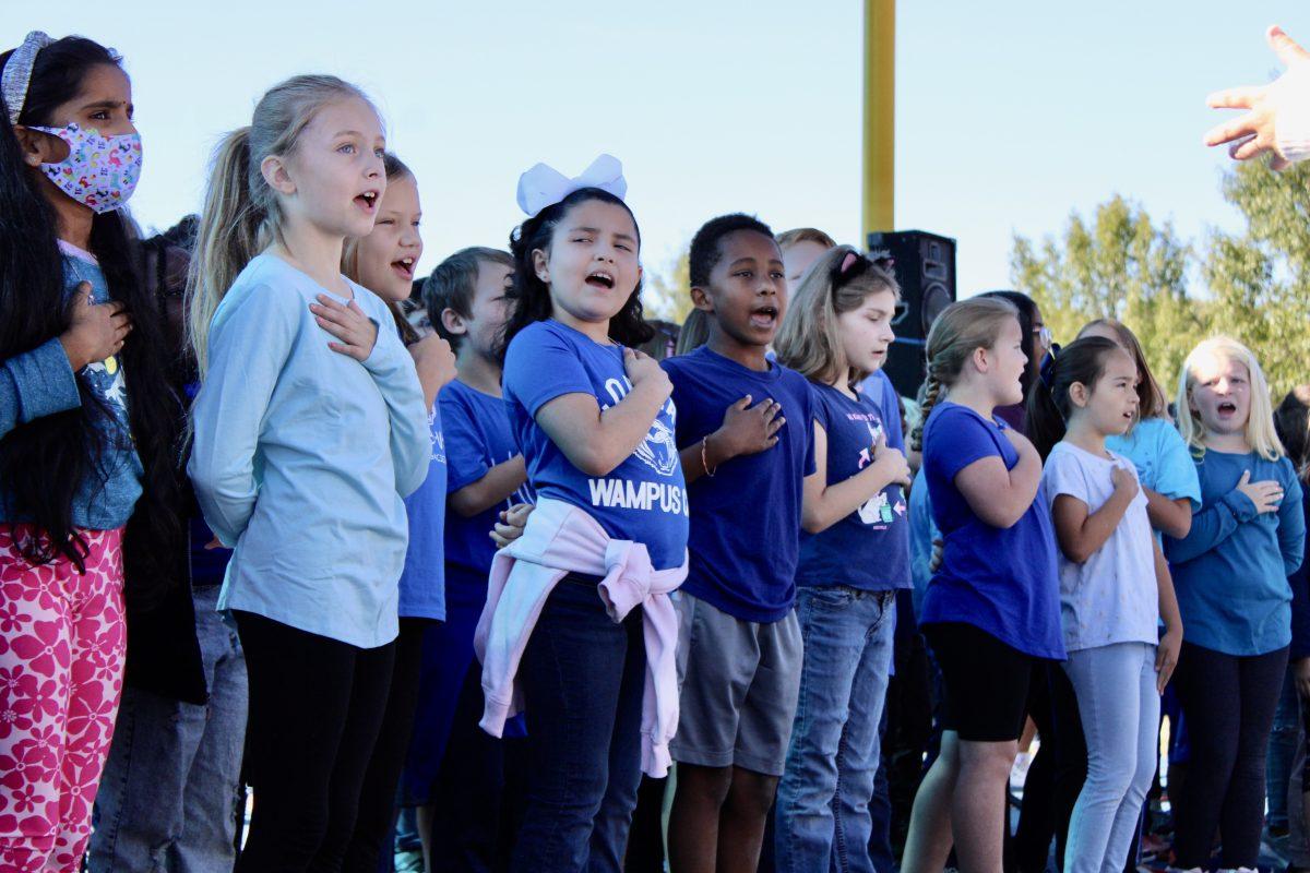 A choir of third- and fourth-grade students from Ida Burns, Woodrow Cummins and others sing to start of the Conway ArtsFest. The choir sang the National Anthem.