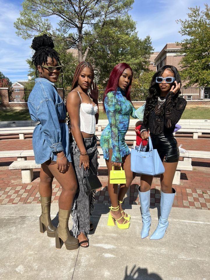 Members of Ebony Models show of their styled looks. The show had three
categories: night out, denim, and monochrome.
