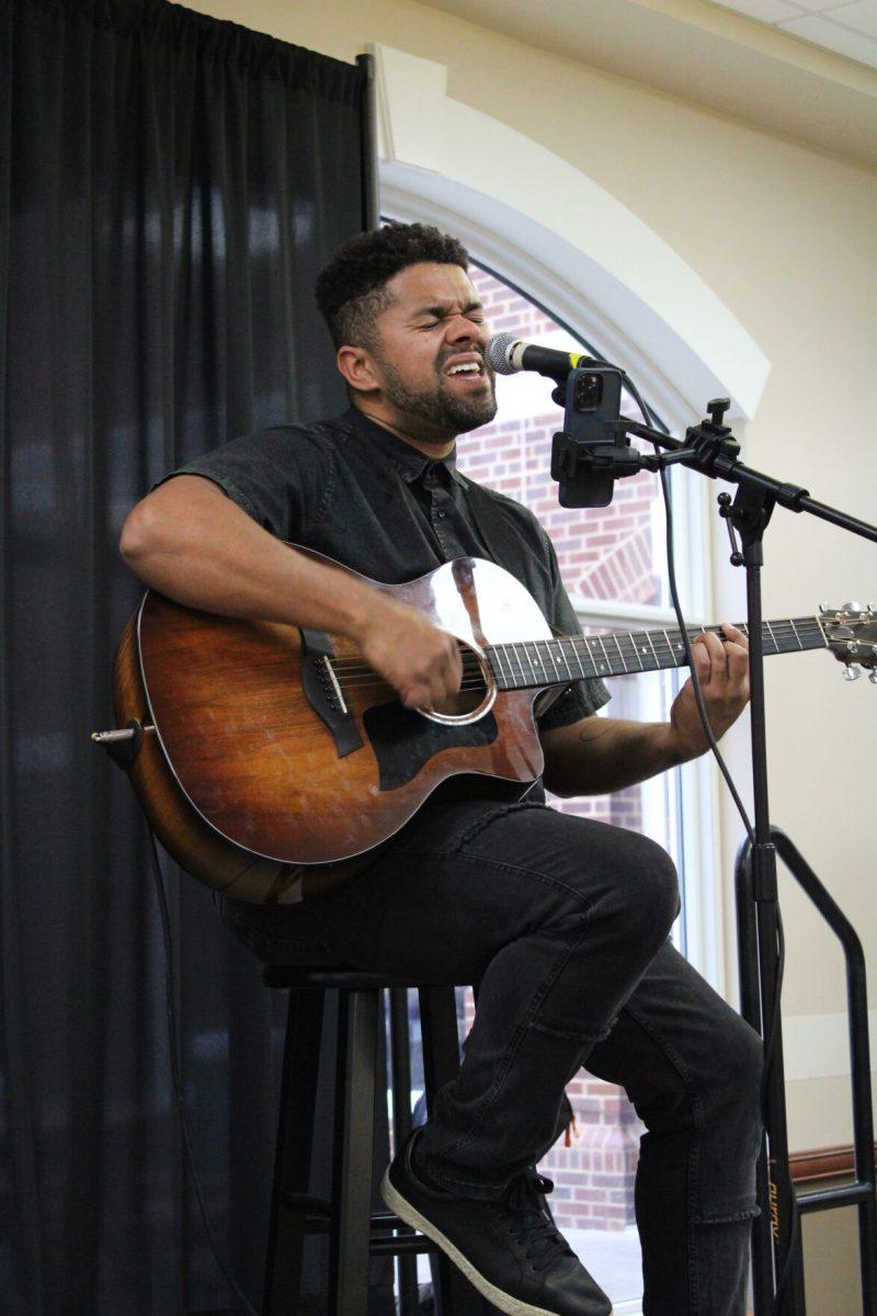 Cameron Bedell, a singer and songwriter from Nashville, Tennessee sings a song while playing the guitar for students dining in the Ronnie Williams Student Center food court. Bedell rose to fame after his cover songs went viral on the internet. Bedell encourages aspiring artists to not be shy and to step out of their comfort zones by using social media to promote their music.
