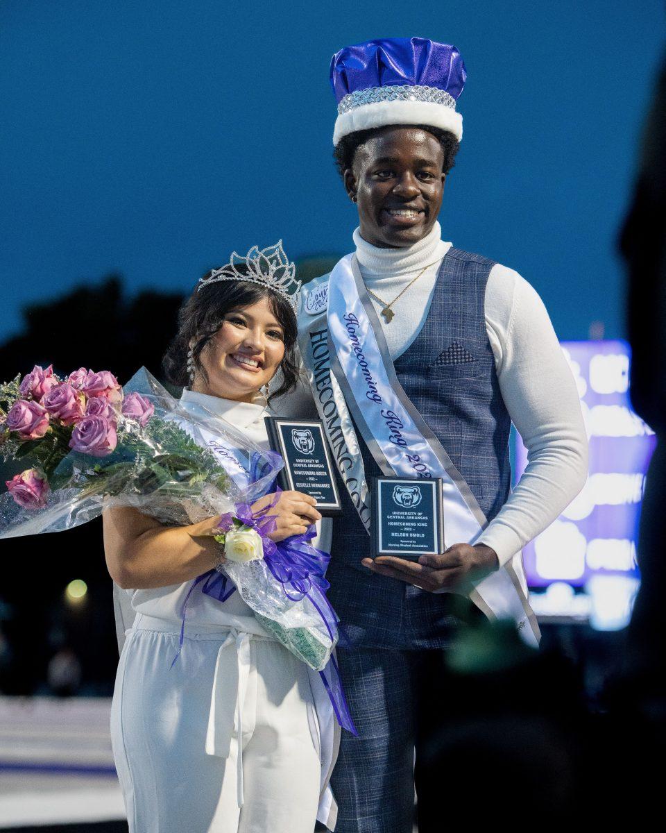 Homecoming Queen Gisselle Hernandez and Homecoming King Nelson Omolo pose after being crowned at Estes Stadium Oct. 29. The two were crowned at the UCA homecoming football game during halftime.