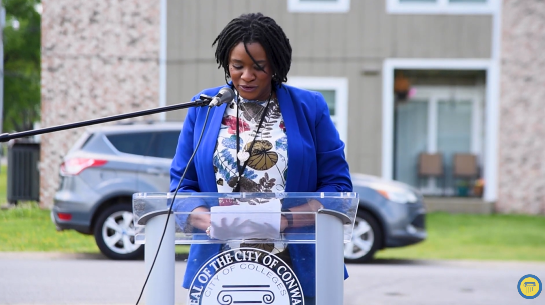Shawanna Rodgers, diversity and economic development coordinator for the city of Conway, gives a speech at the ground-breaking ceremony for the 24-hour emergency overnight shelter. The shelter will be located at 1116 Gum Street.