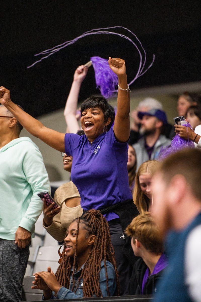 A fan yells in excitement as the UCA women’s basketball team takes the win against the UALR Trojans.