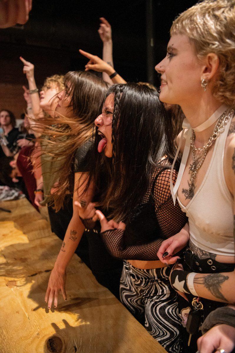 Several audience members enjoy the concert at Full Moon Records on Friday, Jan. 27.