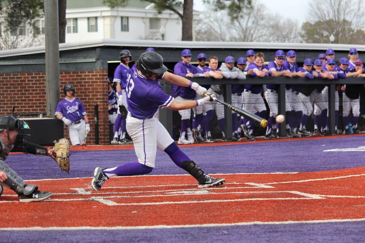 Junior center/infielder A.J. Mendolia cracks the ball toward right field and races to first base. Mendolia scored his first two runs of the season in the third game of the series against Southeast Missouri.