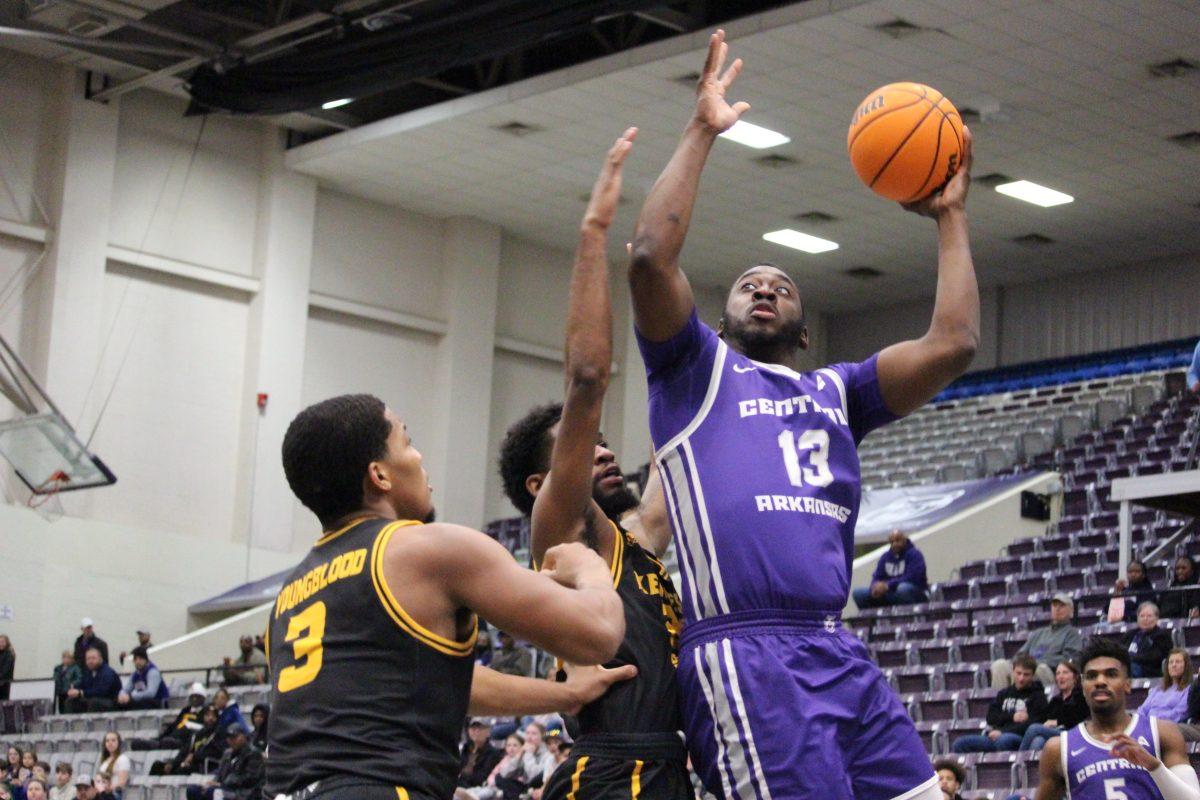 Senior guard/forward Eddy Kayouloud launches himself for a layup against Kennesaw State. Eddy scored a total of 20 points in the game, tying with sophomore guard Camren Hunter.