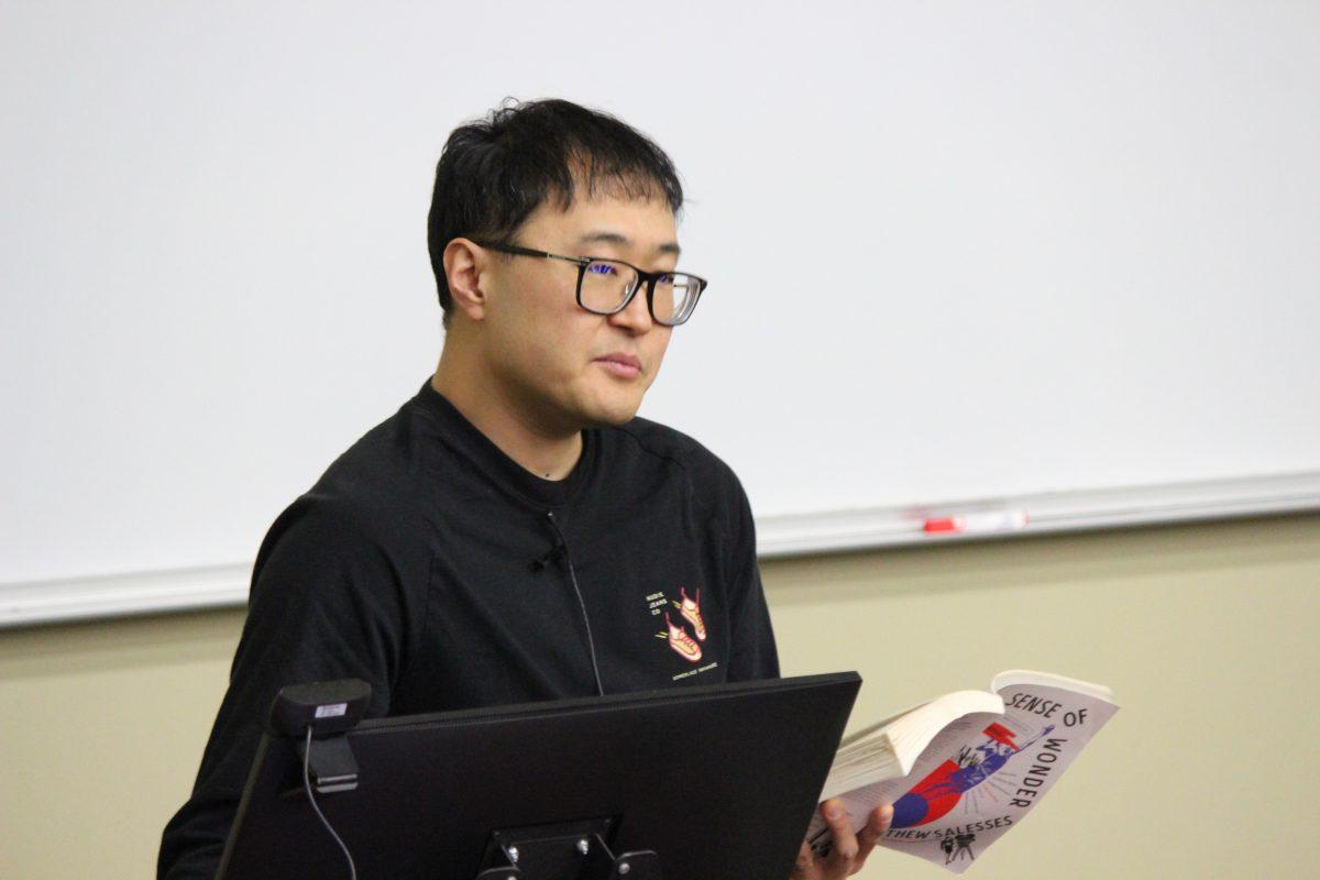 Author Matthew Salesses reads from his novel "The Sense of Wonder" at an Artist in Residence event hosted in UCA's College of Business.