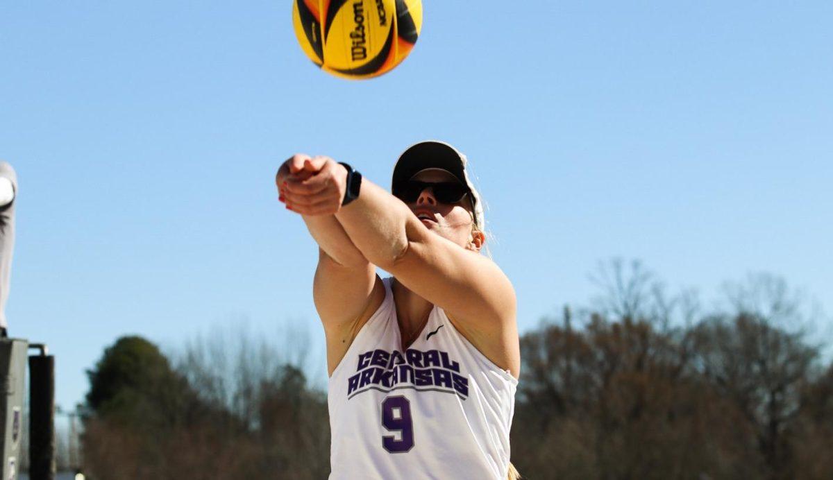 Senior Evelyn Griffith goes for a serve during the Louisiana State tournament. Griffith has earned the Southland All Conference Team Award in 2021 and appeared in the Southland Academic Honor Role in 2020.