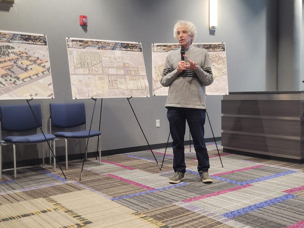 Martin Shuker, principal at RDG Planning &amp; Design, discusses proposedimprovement projects for the Oak Street corridor at Conway City Hall. Theprojects would still need approval from private businesses and the city.