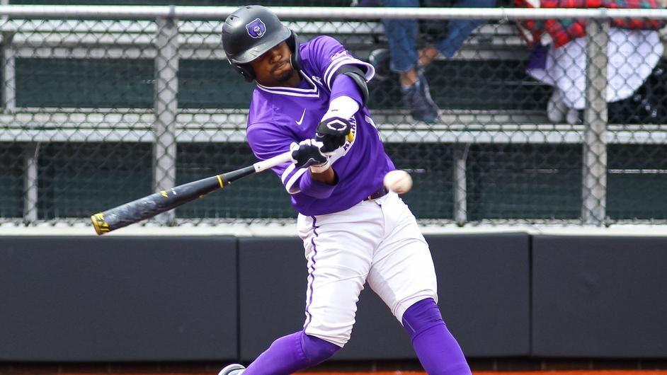 Senior outfielder Kolby Johnson cracks the ball and doubles down left field. Johnson scored a total of three runs during the three game series, scoring one run a game.