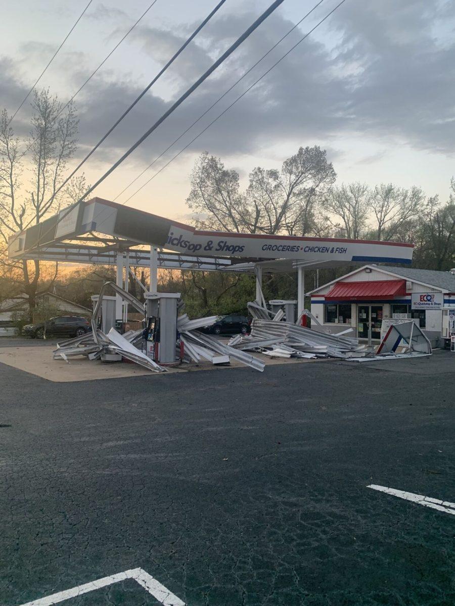 The sun sets on a gas station damaged on Keihl Avenue in Sherwood, Arkansas.
