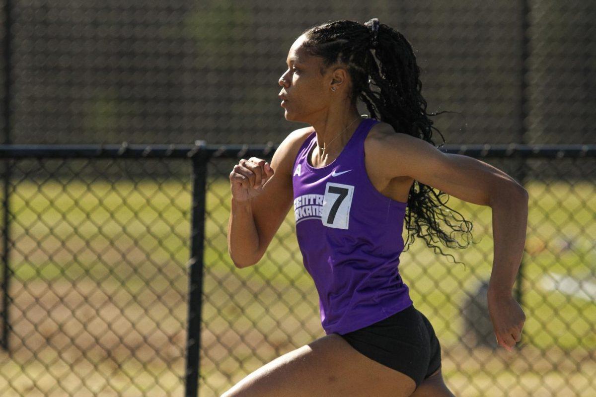 Junior sprinter Ayana Harris rushes the track at the University of Oklahoma. Harris set two personal indoor bests in 2023, including the 60m with a record of 7.79 and the 200m with a record of 25.26.