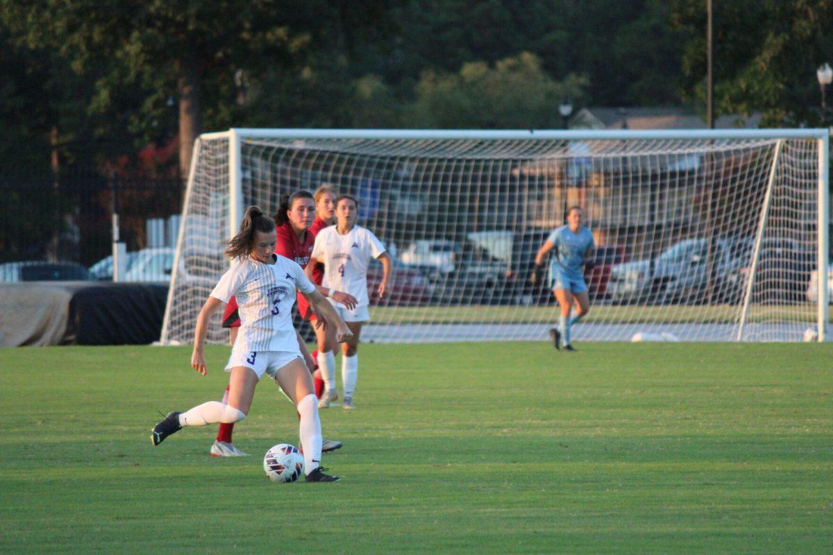 Junior midfielder Kelly Van Gundy keeps possession of the ball, before connecting a pass with her teammate. The Bears broke a losing streak by securing a tie against the A-State Red Wolves on Aug. 27.