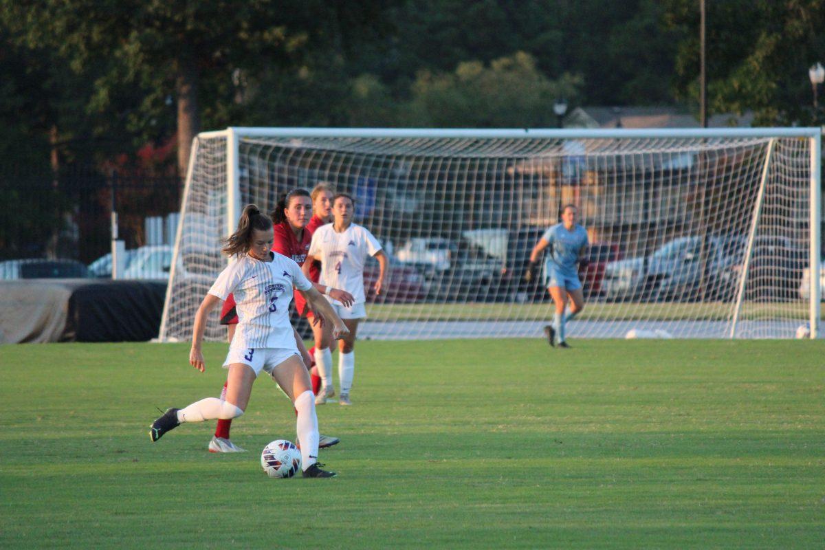Junior midfielder Kelly Van Gundy keeps possession of the ball, before connecting a pass with her teammate. The Bears broke a losing streak by securing a tie against the A-State Red Wolves on Aug. 27.