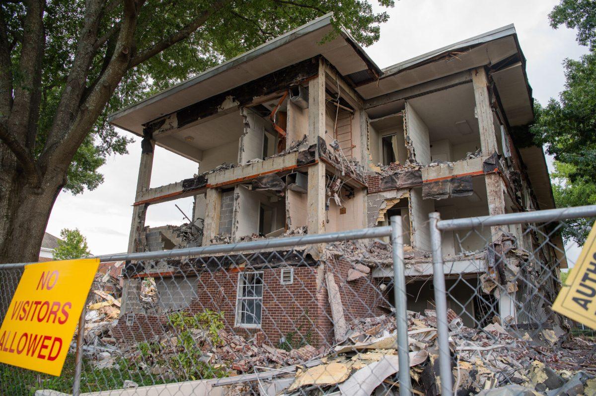 The Short and Denney Hall Demolition earlier this year. The new parking lot being built in its place was delayed from August to October. 