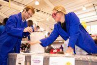 A science RSO demonstrates a chemistry experiment at Conway Daze, a Welcome Week event where students are able to discover different clubs and local businesses. Various clubs give away free items and demonstrated different activities. 