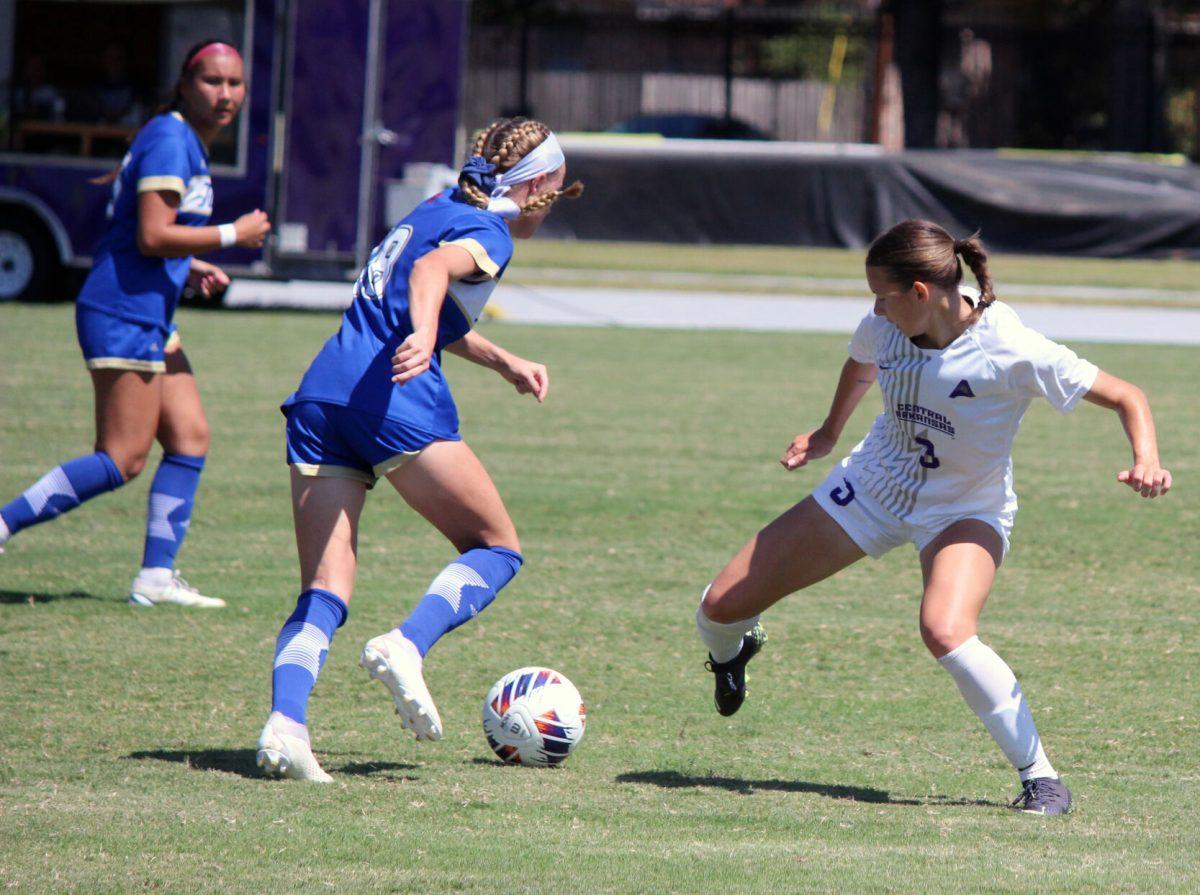 Junior midfielder Kelly Van Gundy steals the ball from an opponent.