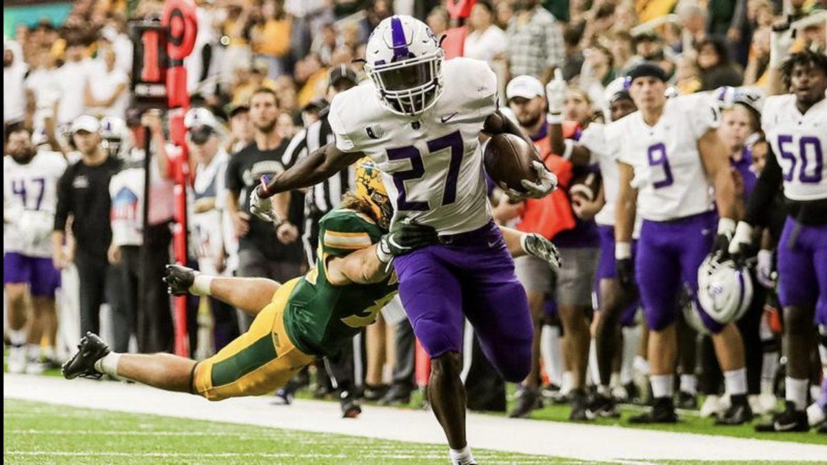 Junior running back ShunDerrick Powell pulls from thegrasps of the Bison defense.