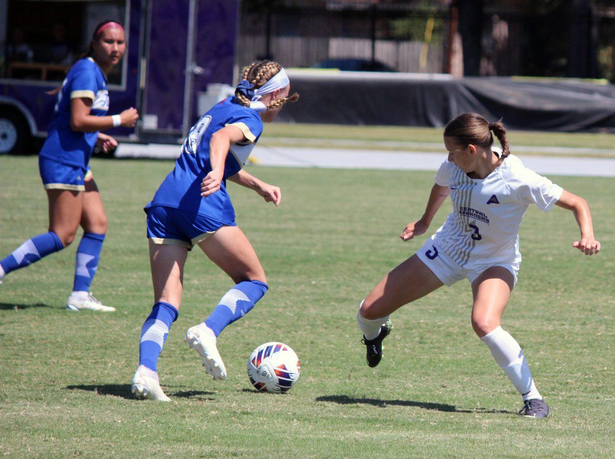 Junior midfielder Kelly Van Gundy steals the ball from an opponent.
