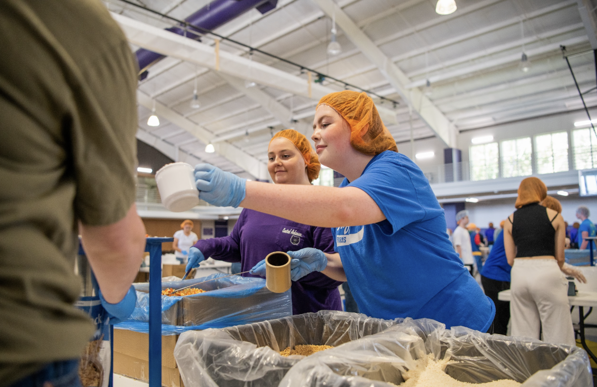 Students pack meals in partnership with Feed My Starving Children. The event is aimed toward freshmen wanting unique volunteer experiences. 