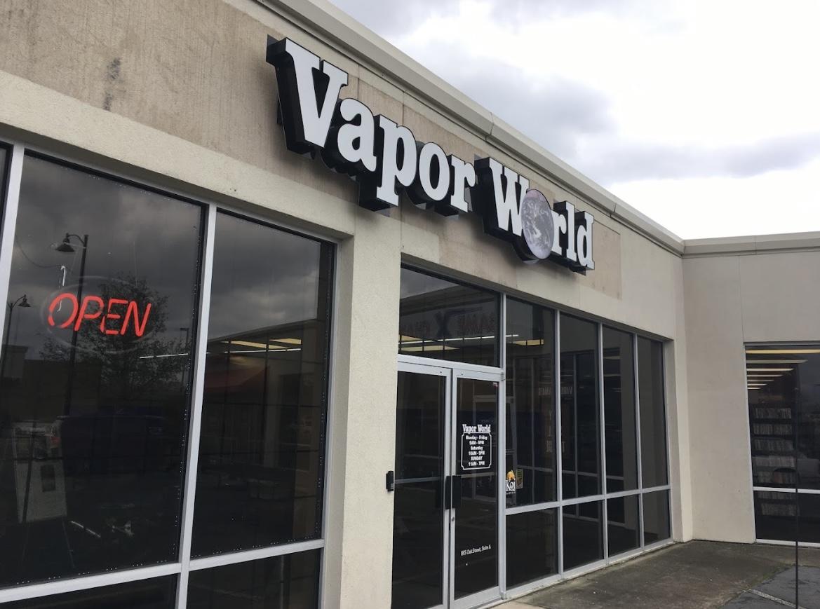 VaporWorld storefront, located on 895 W Oak St, is photographed on a cloudy day. The recent statewide ban on delta-8 products caused the store's sales to drop by 30%/