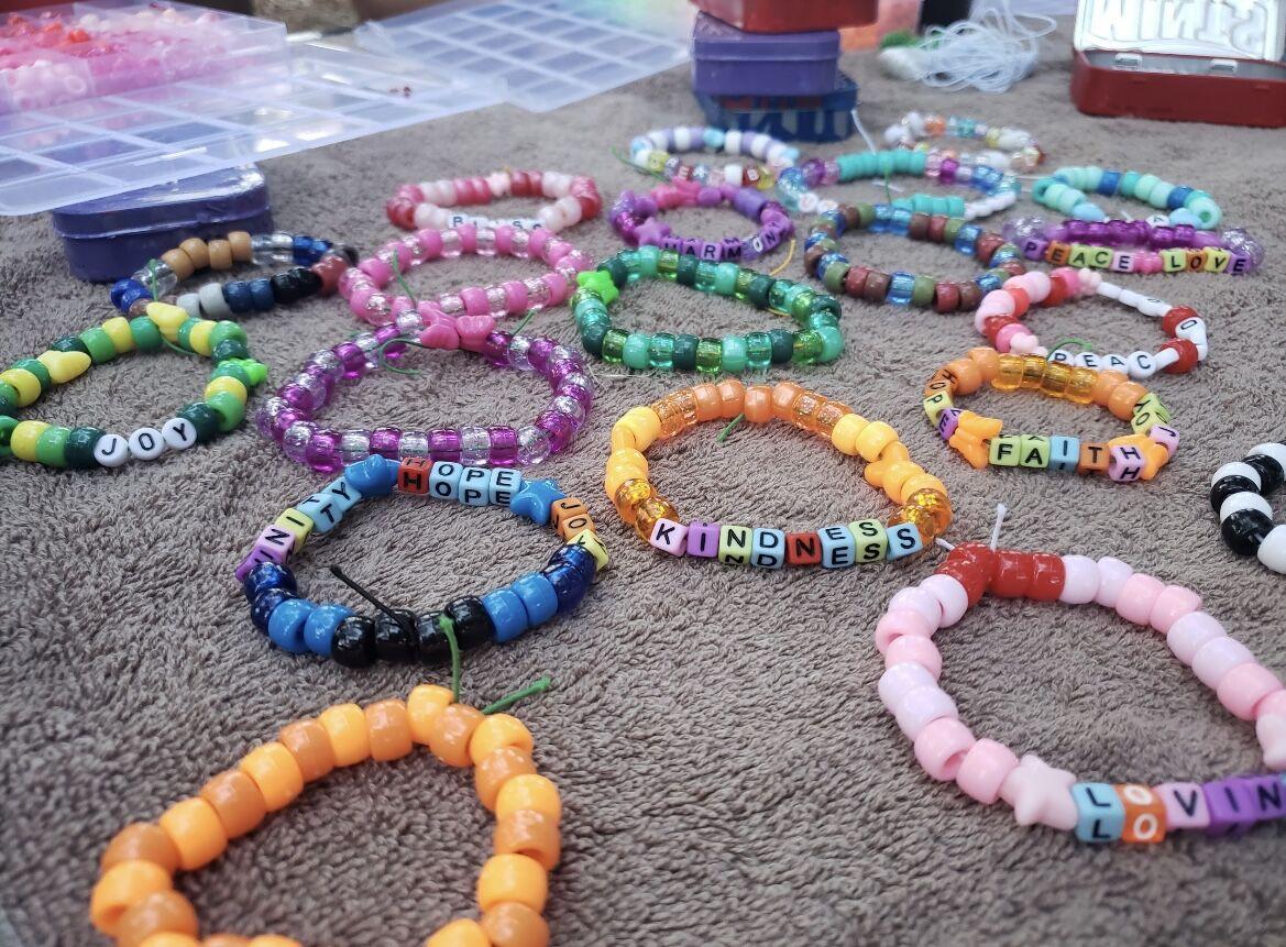 The campout allows students to have fun overnight at the UCA Challenge Course. To promote peace, students made friendship bracelets. 