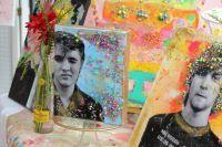 A photo of Elvis adorned with cupcake sprinkles sits atop Kristin Mccaslin’s vendor table. Mccaslin was one of 15 artists showcased at East Village Art Market.