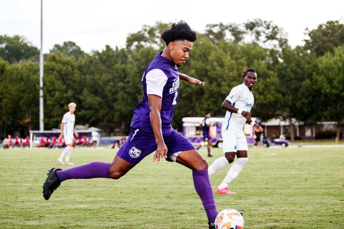 Graduate student and defender Deon Travis passes the ball up the field before defense crowds him. After a loss days before, UCA defeated the Air Force Falcons 2-1. 