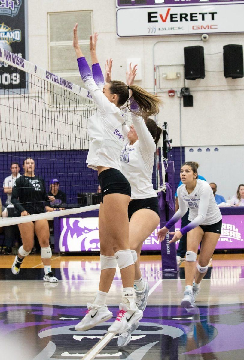 Sugar Bears jump for a block against the Bisons. UCA played five sets against the Bisons, but lost the last set to Lipscomb 15-7.