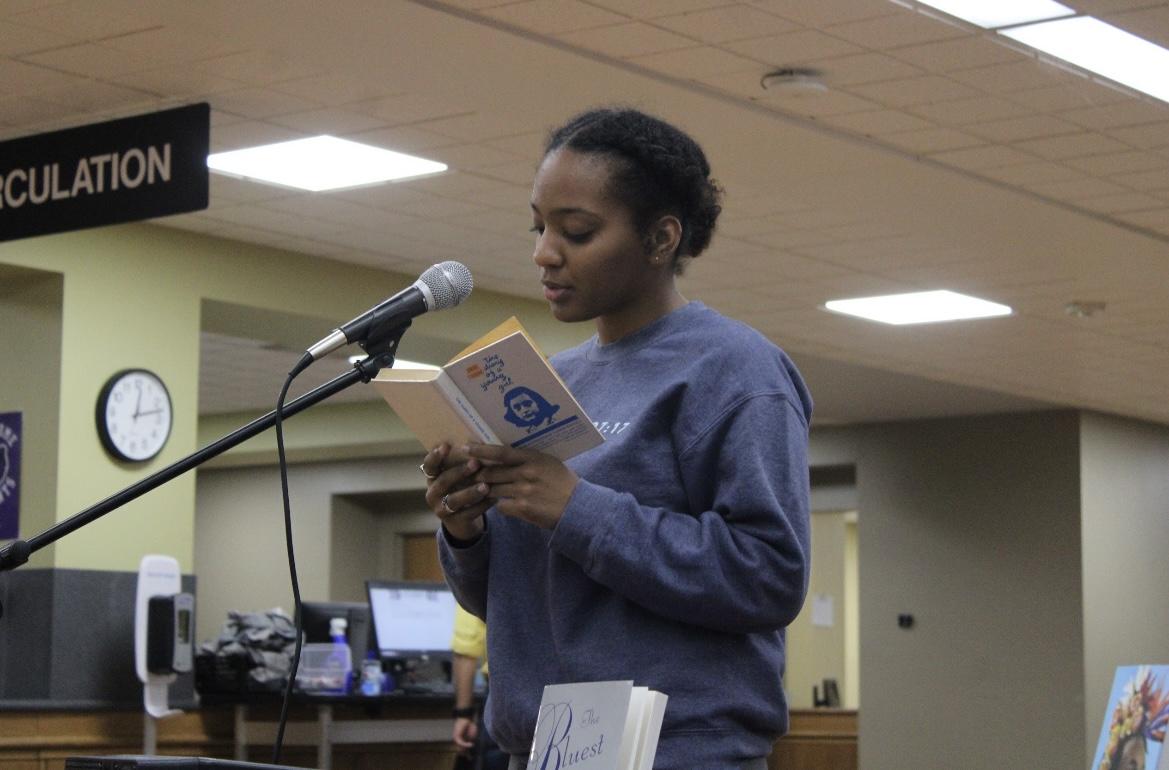 UCA English student reads aloud an excerpt from the popularly banned book "Anne Frank: Diary of a Young Girl" among peers in honor of National Banned Books Week in the Torreyson Library on Oct. 4. The book details Anne Frank’s inhumane experience during the Holocaust and serves as a reminder of injustices from the past that should be remembered.