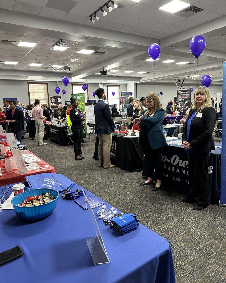 Businesses and employers speak with students at the Career Fair. Students learned more about job and internship opportunities. 