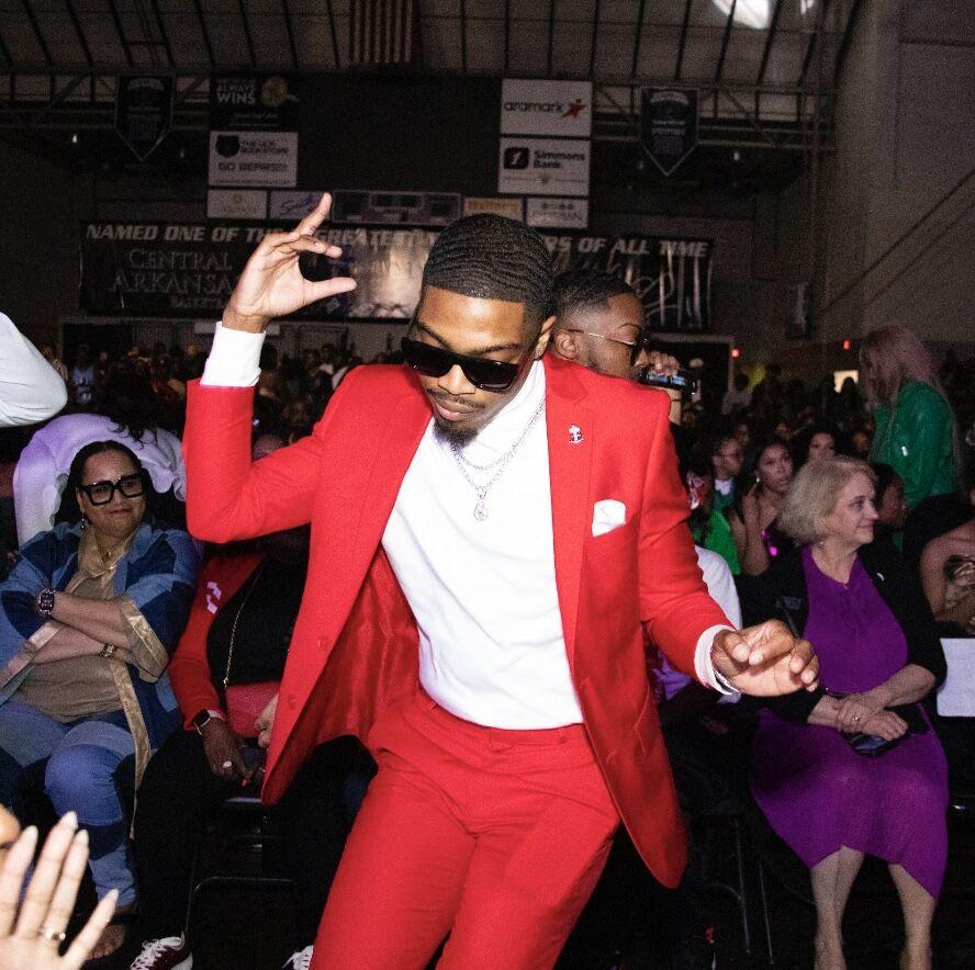 A Kappa Alpha Psi member dances at the annual homecoming step show.
