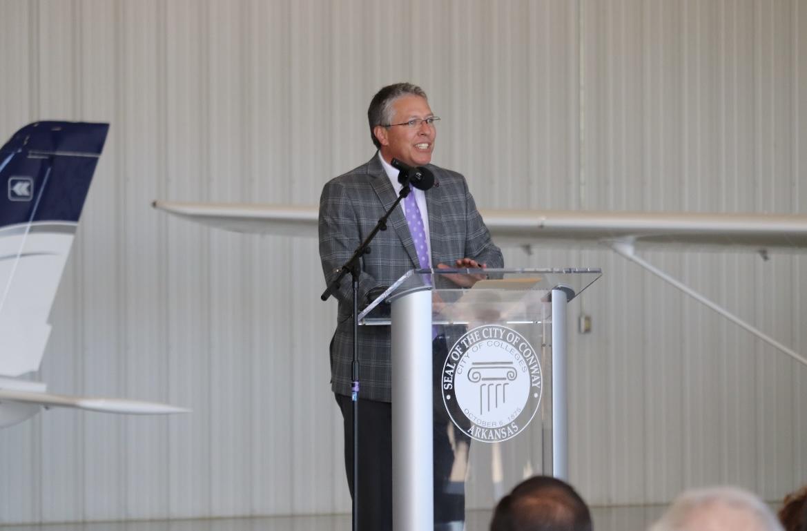 Brad Teague, UCA athletic director and interim director of the UCA Aviation Academy, speaks about the new program at the Conway Municipal Airport, Nov. 15. UCA will begin training pilots next March.