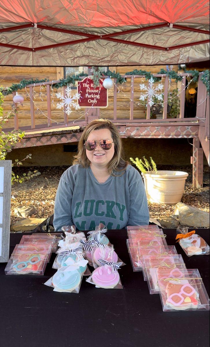 Schylar Hester displays her assortment of custom cookies. A smorgasbord of food and treat vendors populated the market.
