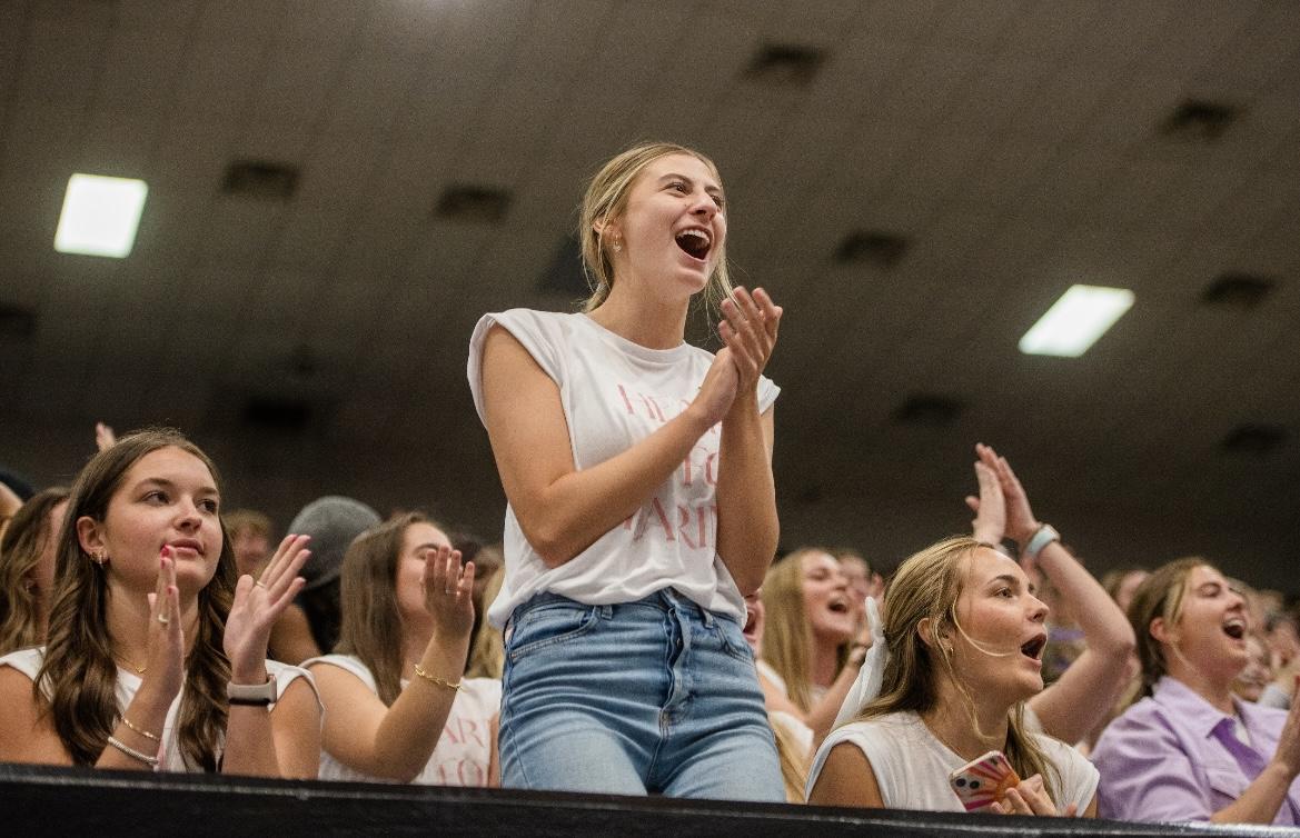  A student cheers at the pep rally.