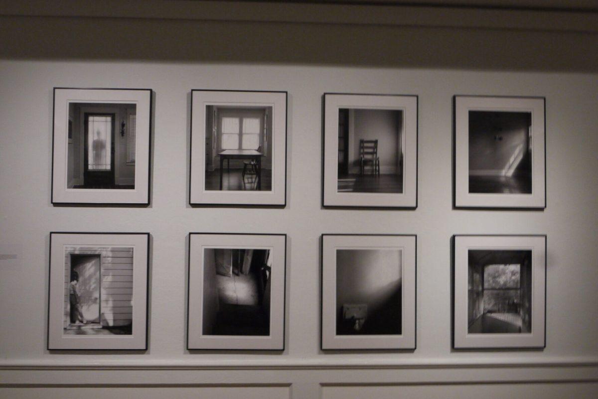 A series of photographs hangs on the walls of the Baum Art Gallery.
