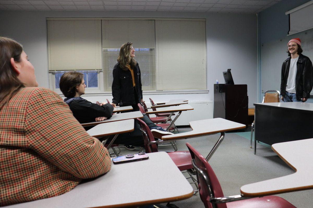 Senior Alex Barnett leads a YDS meeting. Barnett is a co-chair of YDS and said the club aims to replace the on-campus Starbucks.