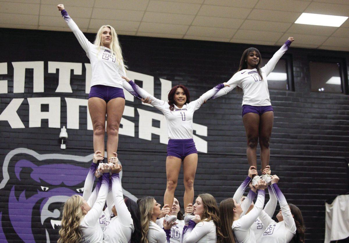 (Left) Junior flyer/tumbler Bailey Dougherty,(center) junior flyer/tumbler Crystal Vuong and (right) sophomore flyer/tumbler Sajala Bell stand high in the air as their teammates hold them up. STUNT now gives UCA female students 10 sports to play.