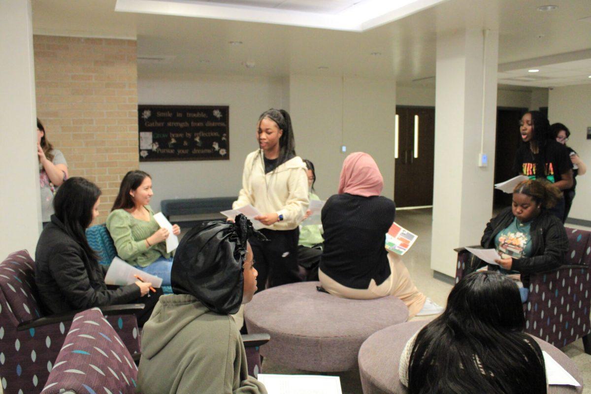 Carmichael Hall residents gather to learn about Black inventors to commemorate icons in African American history. Students were given pamphlets and handouts at the function.