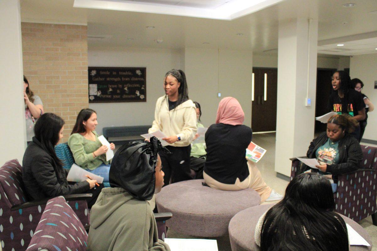 Carmichael Hall residents gather to learn about Black inventors to commemorate icons in African American history. Students were given pamphlets and handouts at the function.