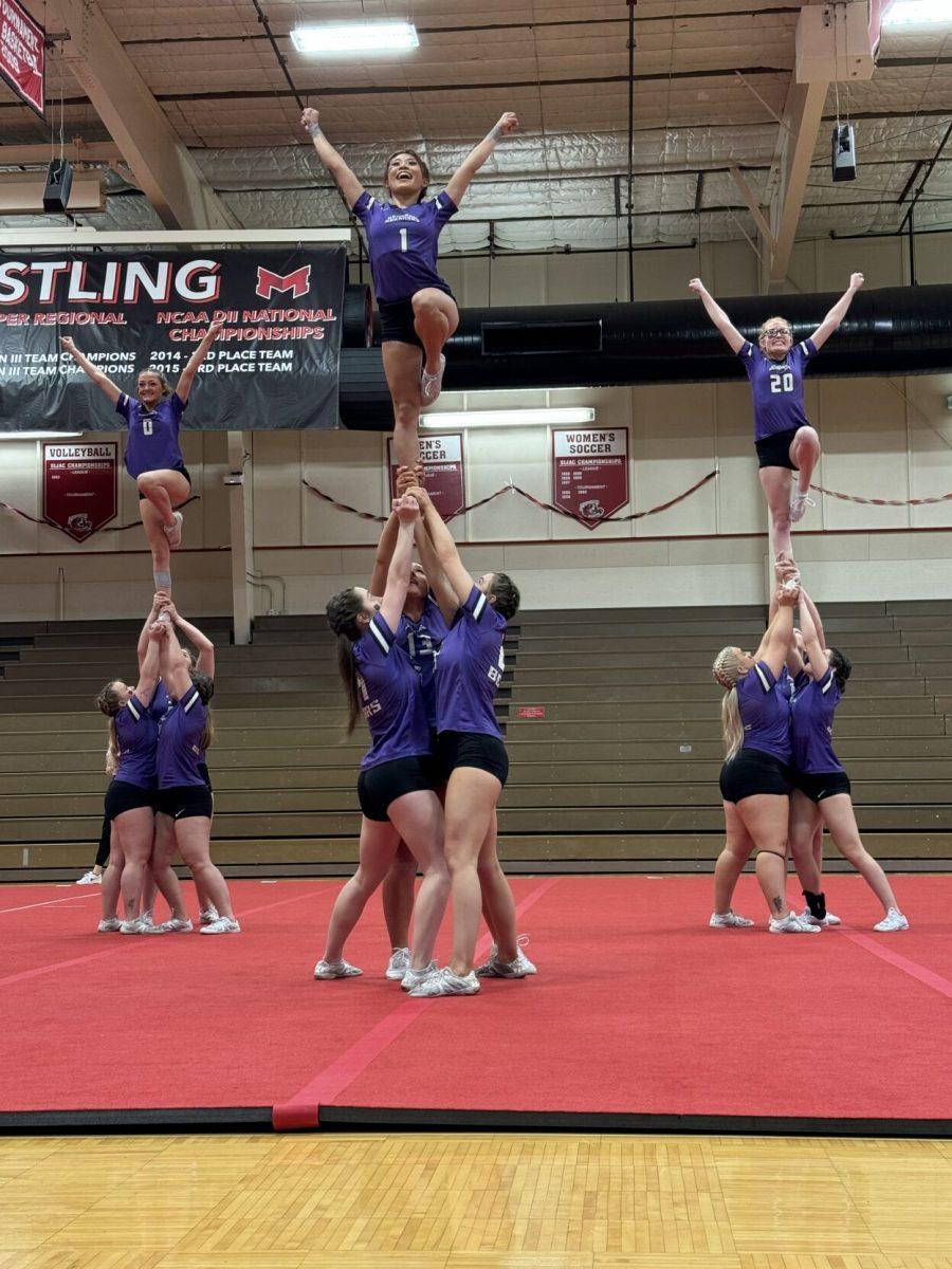 The STUNT team stands proud in three separate formations.