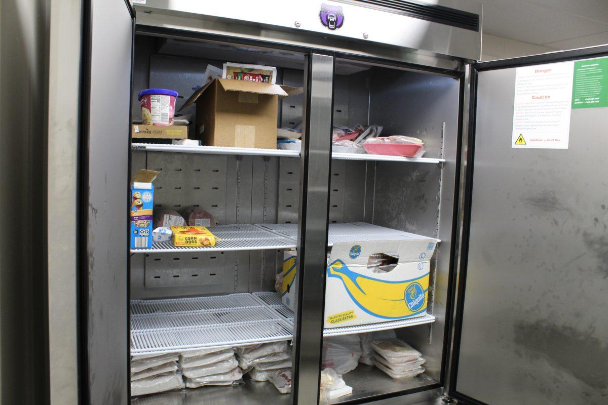 Dozens of frozen items sit in the Bear Essentials Food Pantry's new freezer. The pantry purchased the freezer with a $5,000 grant from the Arkansas Hunger Alliance.