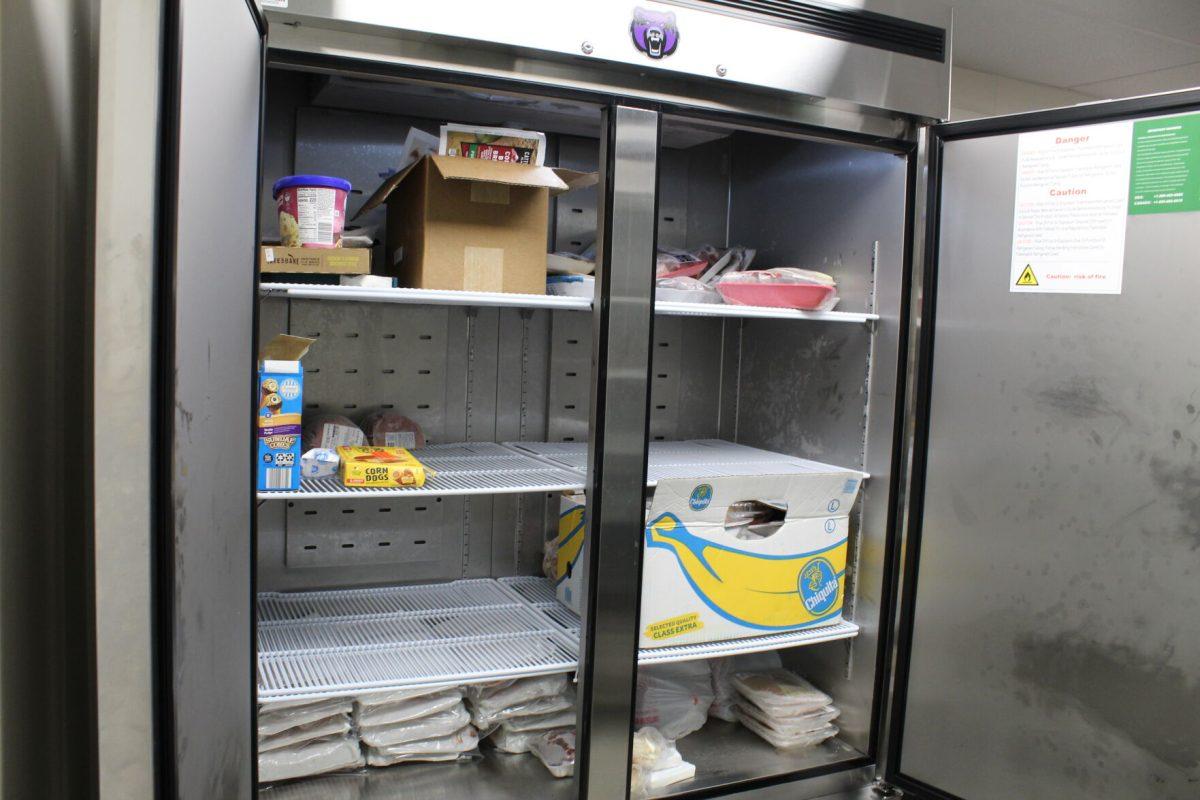 Dozens of frozen items sit in the Bear Essentials Food Pantry's new freezer. The pantry purchased the freezer with a $5,000 grant from the Arkansas Hunger Alliance.