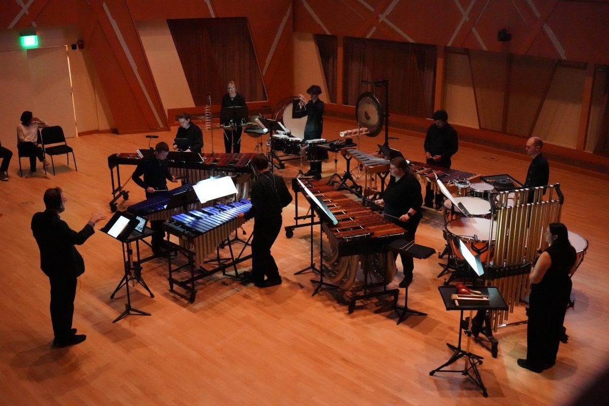 Nine musicians man percussion instruments April 7 while performing professor Blake Tyson’s new score for a special screening of the 1902 film “Voyage dans la Lune.” The event was part of UCA’s Eclipse Festival.