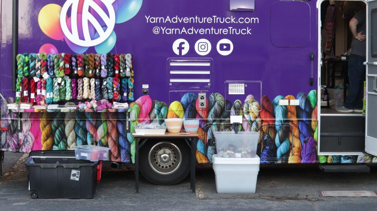 The Yarn Adventure Truck sets up supplies for the UCA alumni event. The event aimed to allow attendees to network and de-stress.